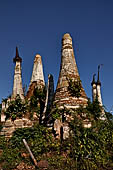 Inle Lake Myanmar. Indein, a cluster of ancient stupas  ruined and overgrown with bushes, just behind the village.